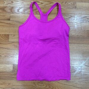 Lululemon in ebb to street tank top in sonic pink. Size 10.